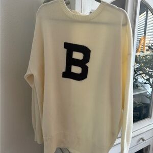 Cream Sweater with Black Lettering